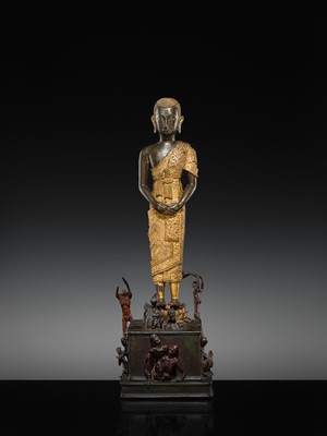 Lot 31 - A LARGE PARCEL-GILT-LACQUERED BRONZE GROUP DEPICTING PHRA MALAI IN HELL, RATTANAKOSIN PERIOD