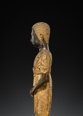 Lot 31 - A LARGE PARCEL-GILT-LACQUERED BRONZE GROUP DEPICTING PHRA MALAI IN HELL, RATTANAKOSIN PERIOD