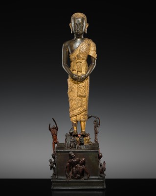 Lot 31 - A LARGE PARCEL-GILT-LACQUERED BRONZE GROUP DEPICTING PHRA MALAI IN HELL, RATTANAKOSIN PERIOD