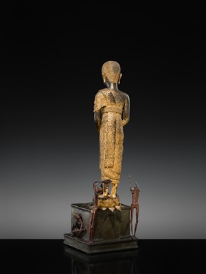 Lot 31 - A LARGE PARCEL-GILT-LACQUERED BRONZE GROUP DEPICTING PHRA MALAI IN HELL, RATTANAKOSIN PERIOD