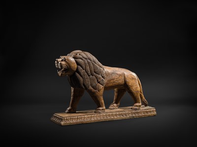 Lot 102 - A LARGE WOOD FIGURE OF A LION, SOUTH INDIA, PROBABLY TAMIL NADU, 19TH-20TH CENTURY