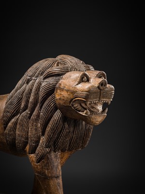 Lot 102 - A LARGE WOOD FIGURE OF A LION, SOUTH INDIA, PROBABLY TAMIL NADU, 19TH-20TH CENTURY