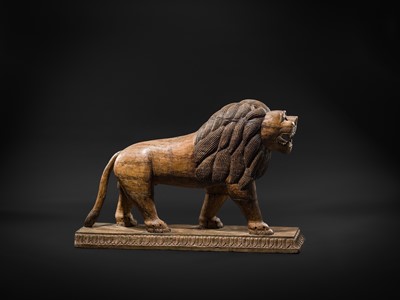 Lot 102 - A LARGE WOOD FIGURE OF A LION, SOUTH INDIA, PROBABLY TAMIL NADU, 19TH-20TH CENTURY