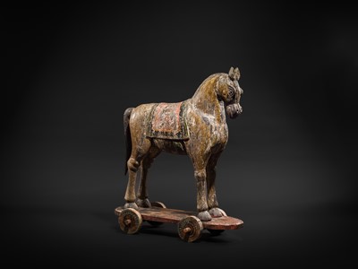 Lot 101 - A RARE AND LARGE POLYCHROME WOOD PULL-TOY HORSE