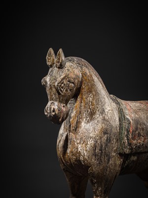 Lot 101 - A RARE AND LARGE POLYCHROME WOOD PULL-TOY HORSE