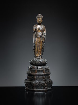 A PARCEL-GILT PEWTER FIGURE OF AMIDA NYORAI