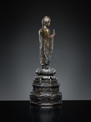 A PARCEL-GILT PEWTER FIGURE OF AMIDA NYORAI