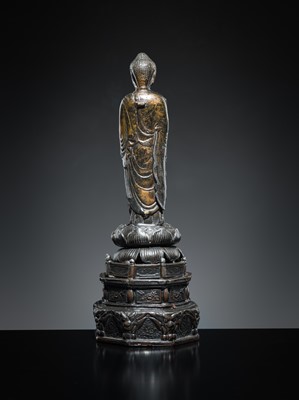 A PARCEL-GILT PEWTER FIGURE OF AMIDA NYORAI