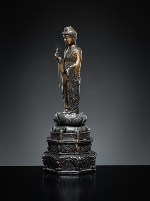 A PARCEL-GILT PEWTER FIGURE OF AMIDA NYORAI