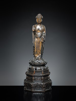 A PARCEL-GILT PEWTER FIGURE OF AMIDA NYORAI