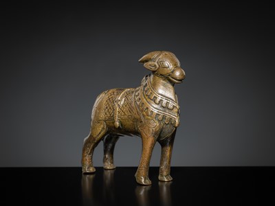 Lot 85 - A COPPER ALLOY FIGURE OF NANDI, NORTHERN INDIA, 18TH-19TH CENTURY
