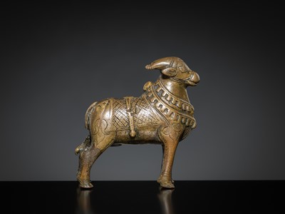 Lot 85 - A COPPER ALLOY FIGURE OF NANDI, NORTHERN INDIA, 18TH-19TH CENTURY
