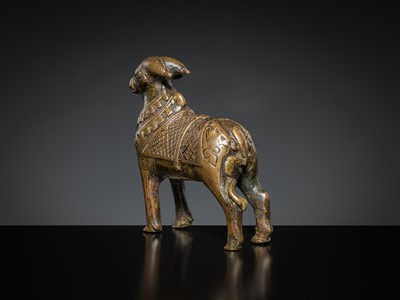 Lot 85 - A COPPER ALLOY FIGURE OF NANDI, NORTHERN INDIA, 18TH-19TH CENTURY