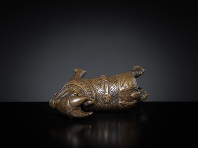 Lot 85 - A COPPER ALLOY FIGURE OF NANDI, NORTHERN INDIA, 18TH-19TH CENTURY