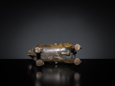 Lot 85 - A COPPER ALLOY FIGURE OF NANDI, NORTHERN INDIA, 18TH-19TH CENTURY