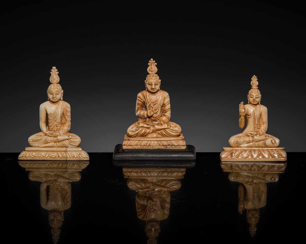 Lot 157 - A GROUP OF THREE MINIATURE IVORY FIGURES OF BUDDHA SHAKYAMUNI, 19TH CENTURY