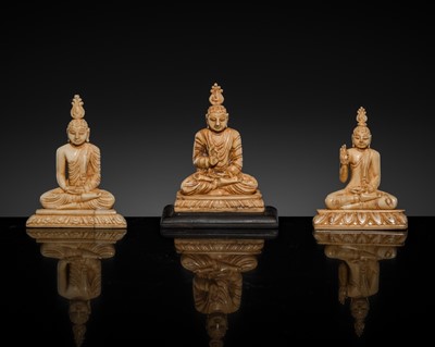 Lot 157 - A GROUP OF THREE MINIATURE IVORY FIGURES OF BUDDHA SHAKYAMUNI, 19TH CENTURY