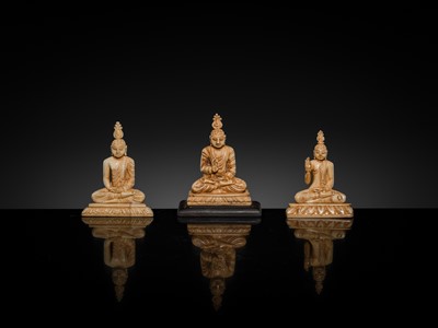 Lot 157 - A GROUP OF THREE MINIATURE IVORY FIGURES OF BUDDHA SHAKYAMUNI, 19TH CENTURY