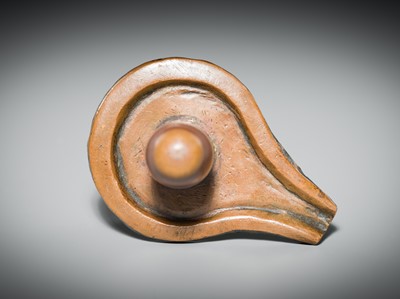Lot 187 - A NARMADA RIVER STONE LINGAM AND COPPER YONI, 19TH CENTURY OR EARLIER