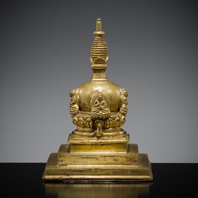 Lot 115 - A GILT-BRONZE SVAYAMBHU STUPA WITH THE FIVE DIRECTIONAL BUDDHAS, 18TH-19TH CENTURY