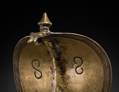 Lot 87 - A BRONZE FIGURE OF NANDI CANOPIED BY A NAGA, 18TH-19TH CENTURY