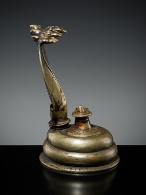 Lot 179 - A BRASS LINGAM WITH FIVE-HEADED NAGA CANOPY, MAHARASHTRA, 18TH-19TH CENTURY