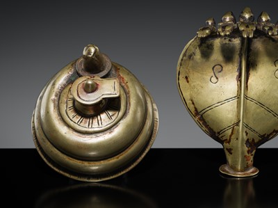 Lot 179 - A BRASS LINGAM WITH FIVE-HEADED NAGA CANOPY, MAHARASHTRA, 18TH-19TH CENTURY