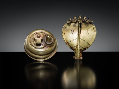 Lot 179 - A BRASS LINGAM WITH FIVE-HEADED NAGA CANOPY, MAHARASHTRA, 18TH-19TH CENTURY