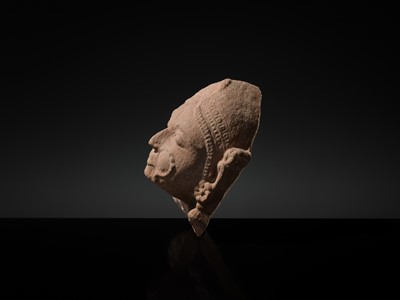 Lot 177 - A PINK SANDSTONE HEAD OF A GANDHARVA, WESTERN INDIA, CIRCA 16TH CENTURY