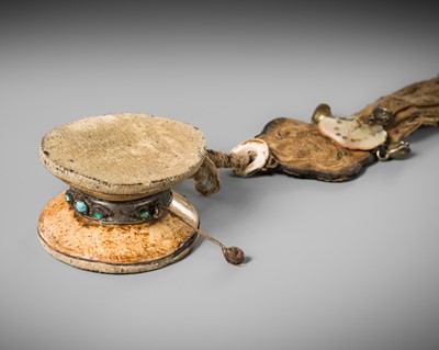 Lot 168 - A BONE RITUAL DRUM WITH SILK TASSELS, DAMARU, TIBET, 18TH CENTURY