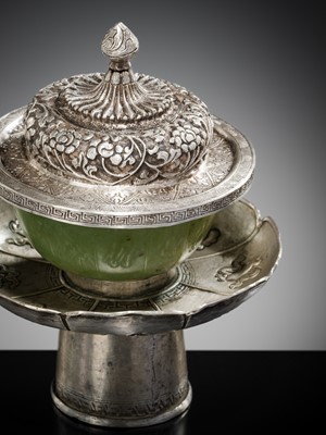 Lot 145 - A REPOUSSÉ SILVER AND SERPENTINE BUTTER TEA SET