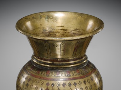 Lot 183 - A COPPER-INLAID BRASS WATER CONTAINER, GANGA-JUMNA LOTA, 17TH-19TH CENTURY
