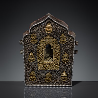 Lot 50 - A REPOUSSÉ SILVER AND GILT-COPPER INLAID ‘BAJIXIANG’ GAU, TIBET, 18TH – 19TH CENTURY