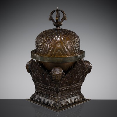 Lot 60 - A COPPER REPOUSSÉ KAPALA AND STAND, TIBET, 18TH-19TH CENTURY