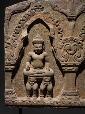 Lot 2 - A SANDSTONE RELIEF DEPICTING SURYA AND CHANDRA FROM THE NAVAGRAHA, ANGKOR PERIOD, 11TH-12TH CENTURY