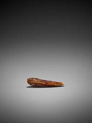 Lot 201 - MASATOSHI: A SUPERB STAG ANTLER NETSUKE OF AN IMAGINARY FISH (SOZU-O)