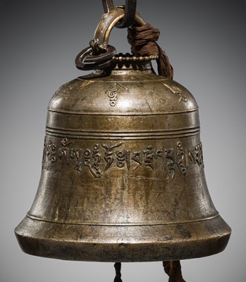 Lot 46 - A LARGE INSCRIBED BRONZE TEMPLE BELL, NEPAL, 18TH-19TH CENTURY