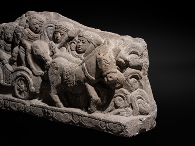 Lot 51 - A RARE ANDESITE RELIEF PANEL DEPICTING RAMA, SITA, AND LAKSHMANA LEAVING AYODHYA FOR EXILE, 9TH-13TH CENTURY