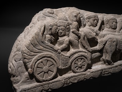 Lot 51 - A RARE ANDESITE RELIEF PANEL DEPICTING RAMA, SITA, AND LAKSHMANA LEAVING AYODHYA FOR EXILE, 9TH-13TH CENTURY