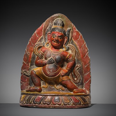 Lot 253 - A LARGE POLYCHROMED TERRACOTTA TSA TSA OF A WRATHFUL DEITY, 18TH-19TH CENTURY