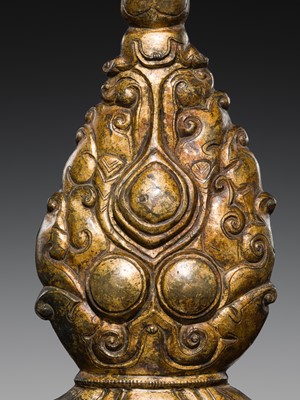 Lot 194 - A LARGE GILT-BRONZE FLAMING TRIPLE GEM PLAQUE, TRIRATNA, TIBET, 15th-16th CENTURY