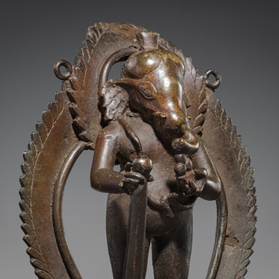 Lot 88 - A BRONZE FIGURE OF GANESHA, NEPAL, 17TH-18TH CENTURY