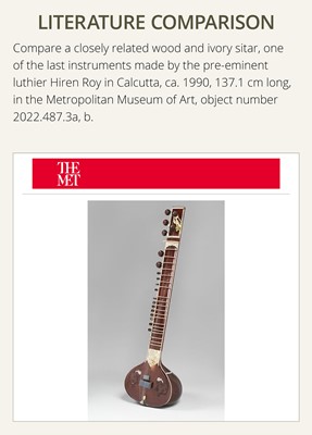 Lot 193 - A BONE-INLAID CARVED WOOD SITAR BY RADHA KRISHNA SHARMA & CO., 20TH CENTURY