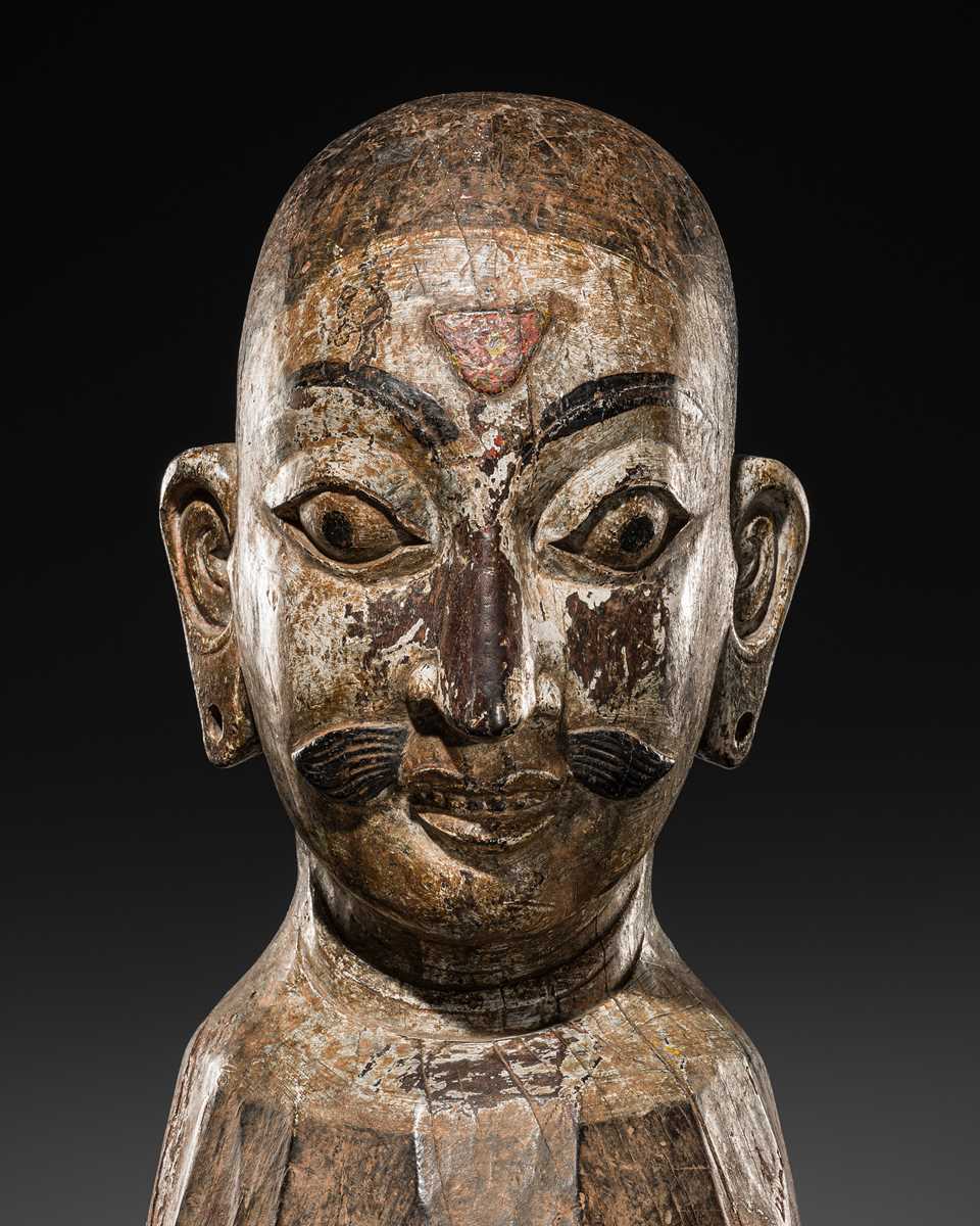 Lot 116 - A RARE CARVED WOOD BUST OF SHIVA, LATE MALLA, THREE KINGDOMS PERIOD