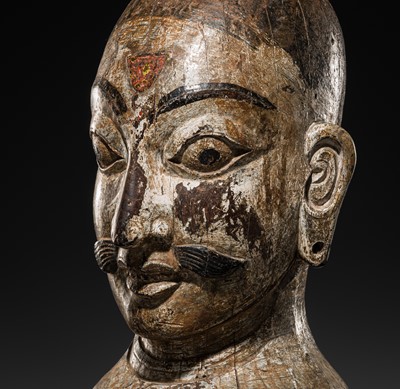 Lot 116 - A RARE CARVED WOOD BUST OF SHIVA, LATE MALLA, THREE KINGDOMS PERIOD