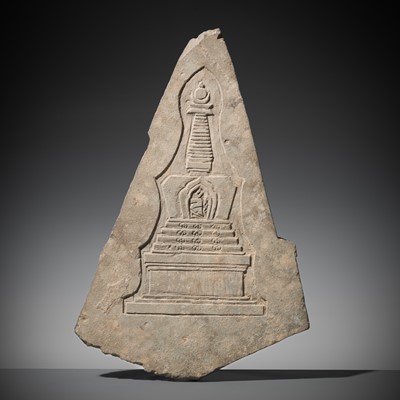 Lot 247 - A MANI ‘STUPA’ STONE, TIBET, 19TH CENTURY OR EARLIER