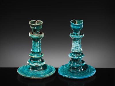 Lot 139 - A GROUP OF TWO RARE PERSIAN TURQUOISE-GLAZED POTTERY OIL LAMPS