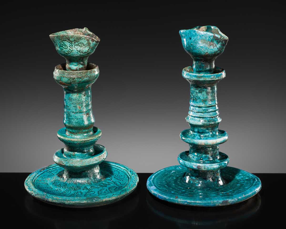 Lot 139 - A GROUP OF TWO RARE PERSIAN TURQUOISE-GLAZED POTTERY OIL LAMPS
