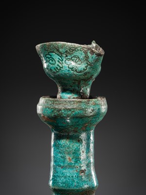 Lot 139 - A GROUP OF TWO RARE PERSIAN TURQUOISE-GLAZED POTTERY OIL LAMPS