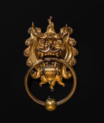 Lot 135 - A RARE GILT-BRONZE ‘BEAST-MASK’ DOOR KNOCKER, QING DYNASTY OR EARLIER